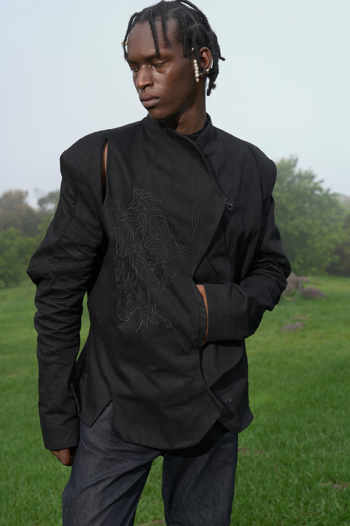 Structured to correct your posture and command your silhouette, it resists at first stiff at the shoulders, firm at the chest then slowly yields. Wear it long enough and it stops being a garment. It becomes a second spine, handmade and built to last.